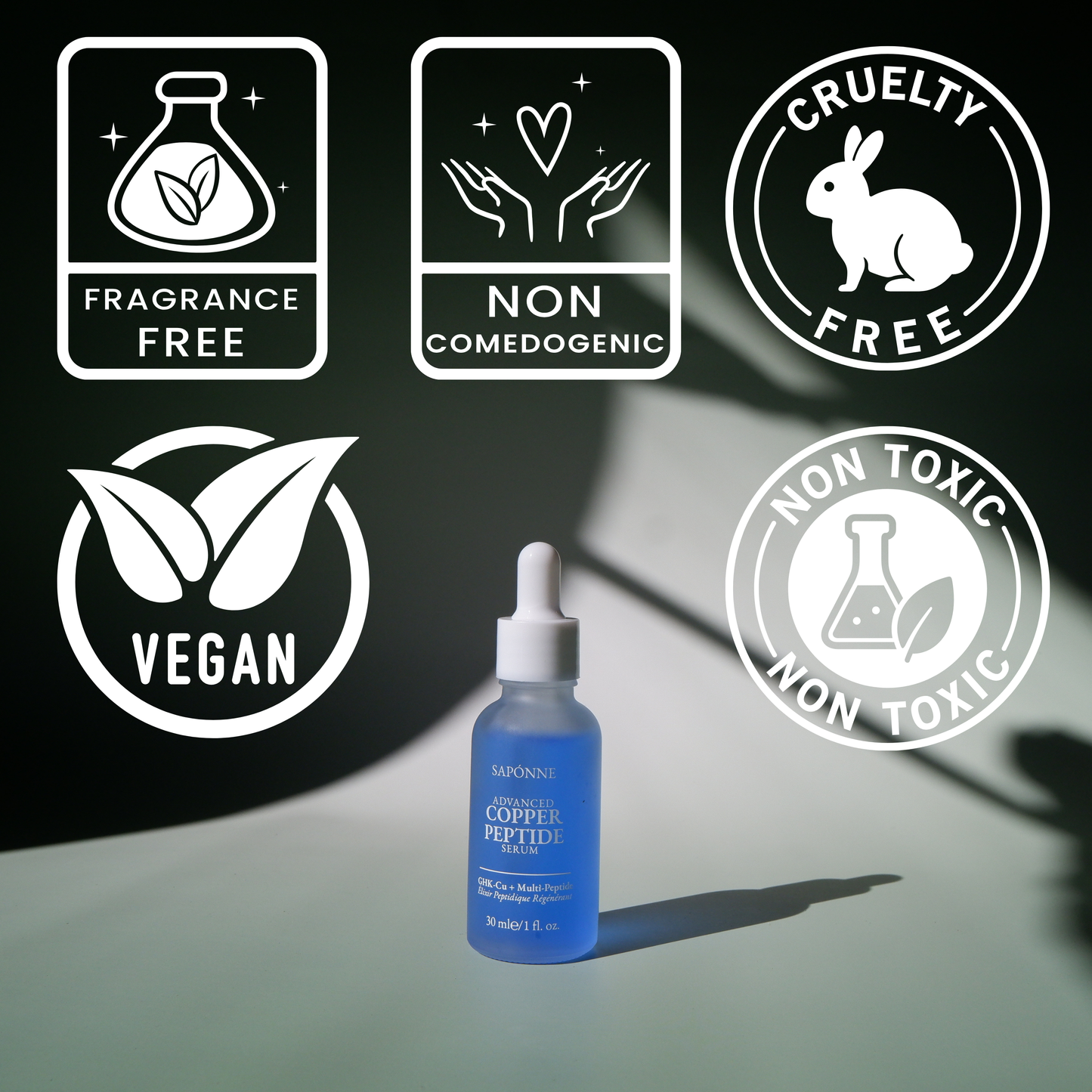 Blue dropper bottle with certification icons on a dark background