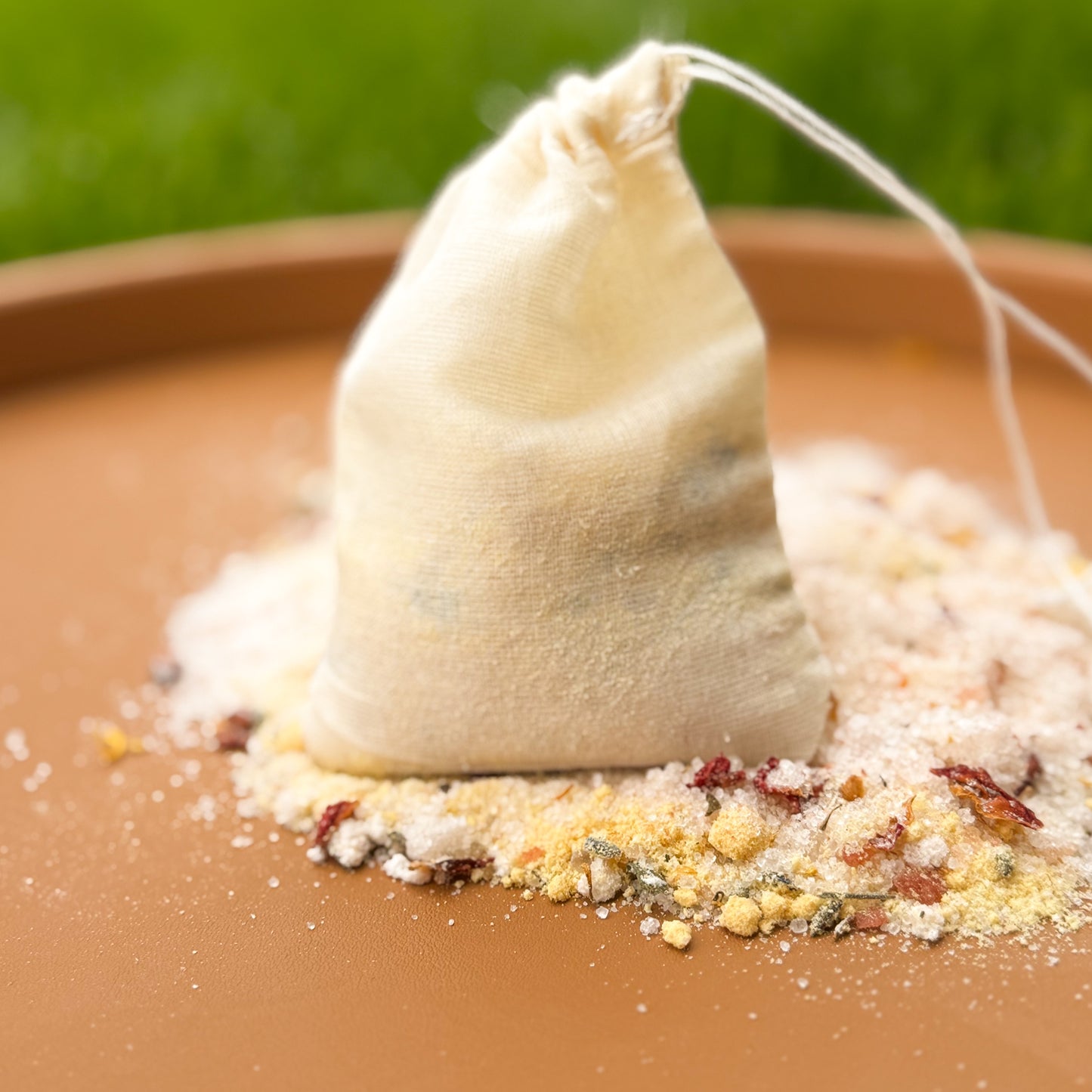 Aromatherapy bath soak with organic botanicals and milk in reusable pouch