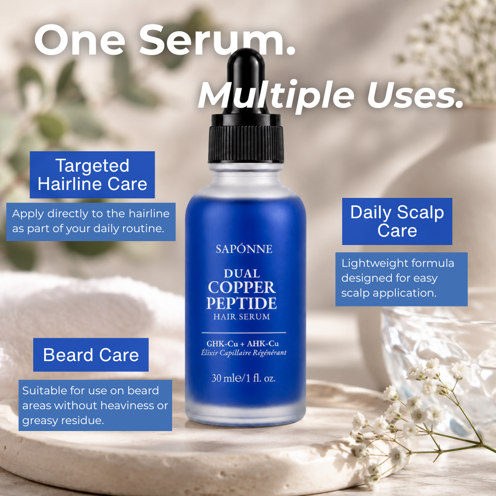 Blue hair serum bottle with text on uses on a blurred natural background