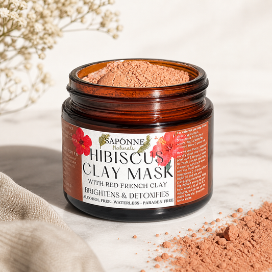 Jar of Saponne Naturals Hibiscus Clay Mask with floral design on label