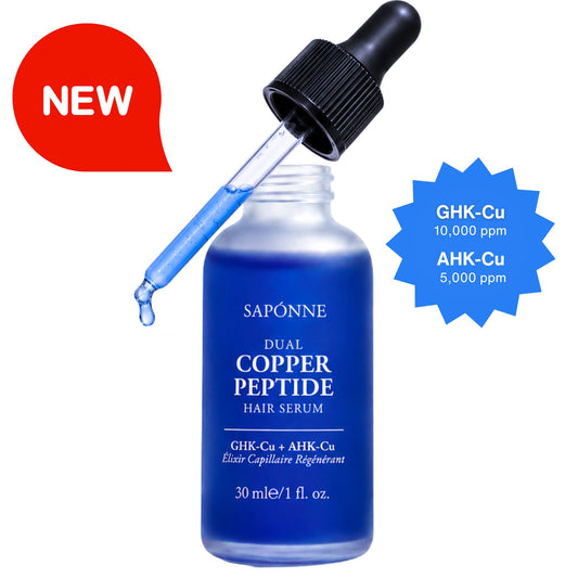 Blue hair serum bottle with dropper labeled 'Saponne Dual Copper Peptide' on a white background